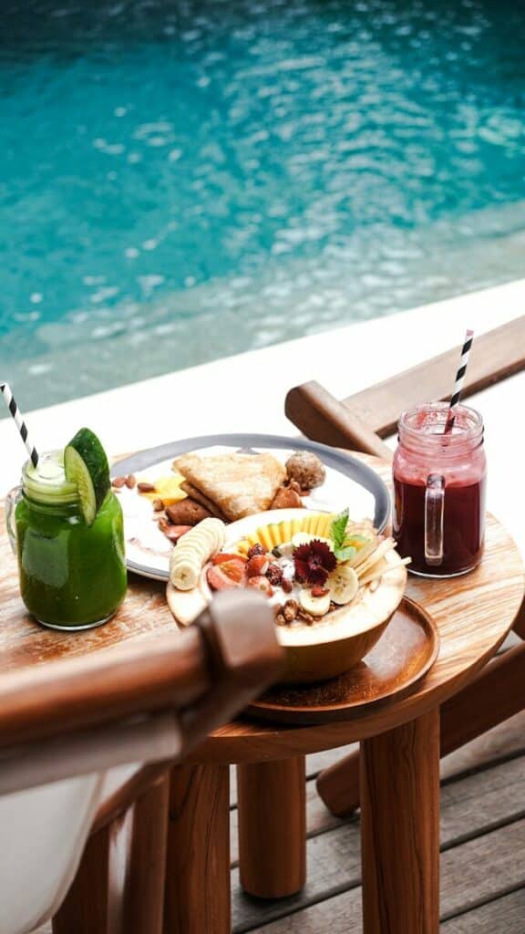 Healthy breakfast spread by the pool