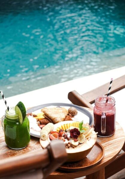 Healthy breakfast spread by the pool